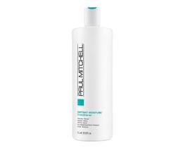 O condicionador Paul Mitchell Instant Moisture 1L hidrata os cabelos secos