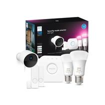 O kit inicial seguro Philips Hue com (1) ponte, (1) câmera de segurança com fio (branca), (2) sensor de contato seguro (branco), (2) lâmpada A19 de 75 W, ambiente branco e colorido, funciona com a Central de Segurança no aplicativo Hue