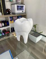 Objeto em formato de dente