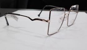 Oculos clin hexagonal dourado Oculos clin hexagonal dourado