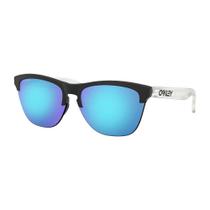 Óculos de Sol Oakley Frogskins Lite Matte Black Matte Clear W/ Prizm Sapphire Iridium Óculos de Sol Oakley Frogskins Lite Matte Black Matte Clear W/ Prizm Sapphire Iridium