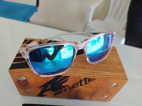 Óculos esporte azul espelhado arnette