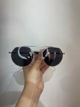 Óculos Masculino Prata redondo em Metal, lentes preta.