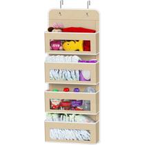 Organizador suspenso de utensílios domésticos simples sobre a porta do armário bege