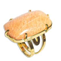 Pacote Atacado com 5 Anéis de Amazonita Rosa em Formato Retangular com Cabochão Dourado e Aro Ajustável Pacote Atacado com 5 Anéis de Amazonita Rosa em Formato Retangular com Cabochão Dourado e Aro Ajustável