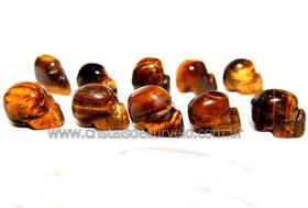 Pacote com 10 Mini Crânios Esculpidos em Pedra Natural Olho de Tigre - Não Pingente - Atacado Pacote com 10 Mini Crânios Esculpidos em Pedra Natural Olho de Tigre - Não Pingente - Atacado