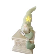 Papai noel sentado verde com ilumnação Papai noel sentado verde com ilumnação