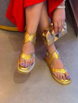 Papete acolchoada com tarchinhas