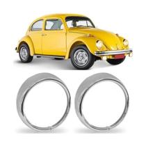 Par aro farol + parafuso fusca 76 a 86 1 furo com parafuso Par aro farol + parafuso fusca 76 a 86 1 furo com parafuso