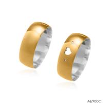 Par de Alianças Bruma encapadas em Ouro 18k com 7mm de largura Par de Alianças Bruma encapadas em Ouro 18k com 7mm de largura
