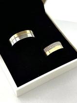Par de Aliancas de Bodas, Ouro 18K Amarelo e Branco, cravado com 2 fileiras de Zirconias Par de Aliancas de Bodas, Ouro 18K Amarelo e Branco, cravado com 2 fileiras de Zirconias
