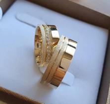 Par de Alianças de Ouro 18K coleçao Stratus de 5 mm e meia volta de Zirconias Par de Alianças de Ouro 18K coleçao Stratus de 5 mm e meia volta de Zirconias