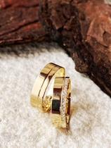Par de Alianças de Ouro 18K modelo Diana 5 mm e cravado de Zircônias. ENVIE MSG NO CHAT PARA INFORMAR NUMERACAO E GRAVACAO Par de Alianças de Ouro 18K modelo Diana 5 mm e cravado de Zircônias. ENVIE MSG NO CHAT PARA INFORMAR NUMERACAO E GRAVACAO