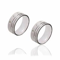 Par de alianças de Prata de 12 g e 8mm cravejado de Zirconias.