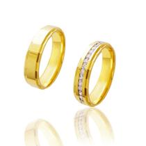 Par de Alianças em Ouro 18K colecao Luna com 11g e 5 mm cravada com Zirconias. Par de Alianças em Ouro 18K colecao Luna com 11g e 5 mm cravada com Zirconias.
