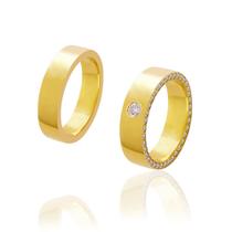 Par de Alianças em Ouro 18K colecao Luna de 14g e 5 mm cravada lateralmente de Zirconias.
