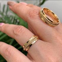 Par de Aliancas em Ouro 18K com 5mm da colecao Makom com trançado manual e 2 pedras