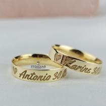 Par de alianças nomes - ouro 18k