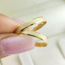 Par de Aliancas Ouro 18K Luna com 2 mm largura, bordas chanfradas e diamantada Par de Aliancas Ouro 18K Luna com 2 mm largura, bordas chanfradas e diamantada
