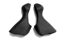Par de capas de STI X-ON XGB-17 p/ Shimano St-5700 Par de capas de STI X-ON XGB-17 p/ Shimano St-5700