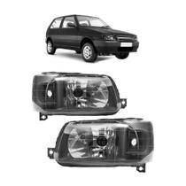 Par farol fiat uno 04/13 ld le masc. negra "policarbonato" Par farol fiat uno 04/13 ld le masc. negra "policarbonato"