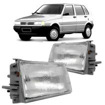 Par farol fiat uno 91/03 lente de vidro Par farol fiat uno 91/03 lente de vidro