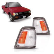 Par pisca seta hilux 1993 a 2001 4x2 cristal/ambar aro cinza