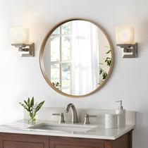 Parede de espelho além de madeira redonda de 70 cm de diâmetro, cor de mel