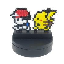 Peça de Pokémon para decorar seu espaço Ash e Pikachu Peça de Pixel art feita com miçanga. Peça de Pokémon para decorar seu espaço Ash e Pikachu Peça de Pixel art feita com miçanga.