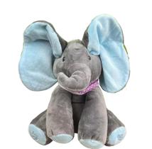 Pelúcia Elefante 30cm Com Movimento Na Orelha E Musica