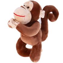 Pelucia macaco filhote da luci 20cm santa klaus