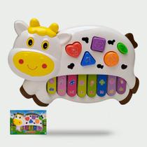 Pianinho Bebe Brinquedo Infantil Educativo Musical Baby - Vaquinha (Branco) - DM TOYS