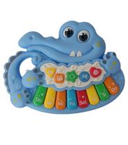 Piano infantil jacare a pilha som/luz mtk011a 626291b9-ty cor:azul Piano infantil jacare a pilha som/luz mtk011a 626291b9-ty cor:azul