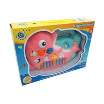 Piano infantil teclado golfinho musical na cor rosa.