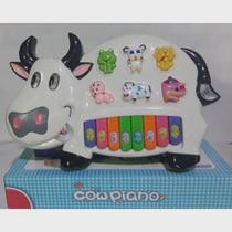 Piano Teclado Musical Infantil Com Som E Luz Modelo Vaquinha e muito divertido,