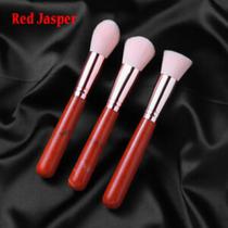 Pincel de maquiagem vermelho Pincel de maquiagem vermelho