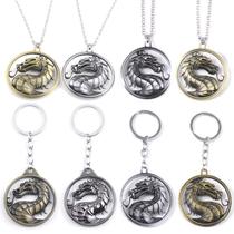 Pingente de chaveiro Mortal Kombat Dragon Logo Dourado/Prateado Pingente de chaveiro Mortal Kombat Dragon Logo Dourado/Prateado