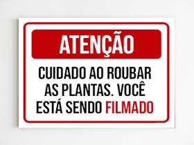 Placa aviso cuidado ao roubar as plantas esta sendo filmado