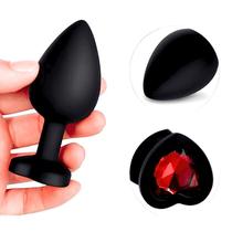 Plug Anal em Silicone Base Coração Médio Preto com Pedra Vermelha