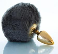 Plug dourado com pompom médio