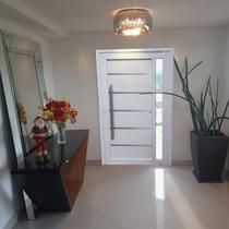 Porta de PVC Pivotante 216x130cm Miraggio Tecplus100 Brimak Abertura Esquerda Porta de PVC Pivotante 216x130cm Miraggio Tecplus100 Brimak Abertura Esquerda