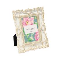 Porta-retratos Laura Ashley 5x7cm com decoração floral em ouro branco Porta-retratos Laura Ashley 5x7cm com decoração floral em ouro branco