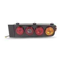 PR20446310 Lanterna Traseira Universal Sem Lâmpada Tricolor Fume Ld Com Aba PR20446310 Lanterna Traseira Universal Sem Lâmpada Tricolor Fume Ld Com Aba