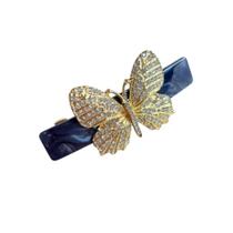 Presilha de Cabelo Mesclada com Borboleta Dourada e Pedras de Strass