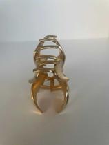 Presilha flor m etal dourado grande