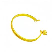 Pulseira aberta banhada a ouro para mulheres com símbolos gravados Pulseira aberta banhada a ouro para mulheres com símbolos gravados