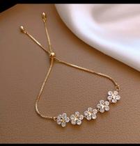 Pulseira banhada a ouro com zircônias