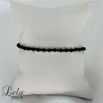 Pulseira com cristais pretos facetados folheado a ouro