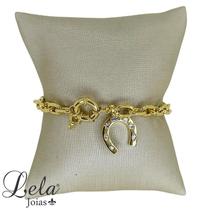 Pulseira com ferradura e zirconias folheado em ouro 18k