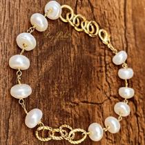 Pulseira de perolas